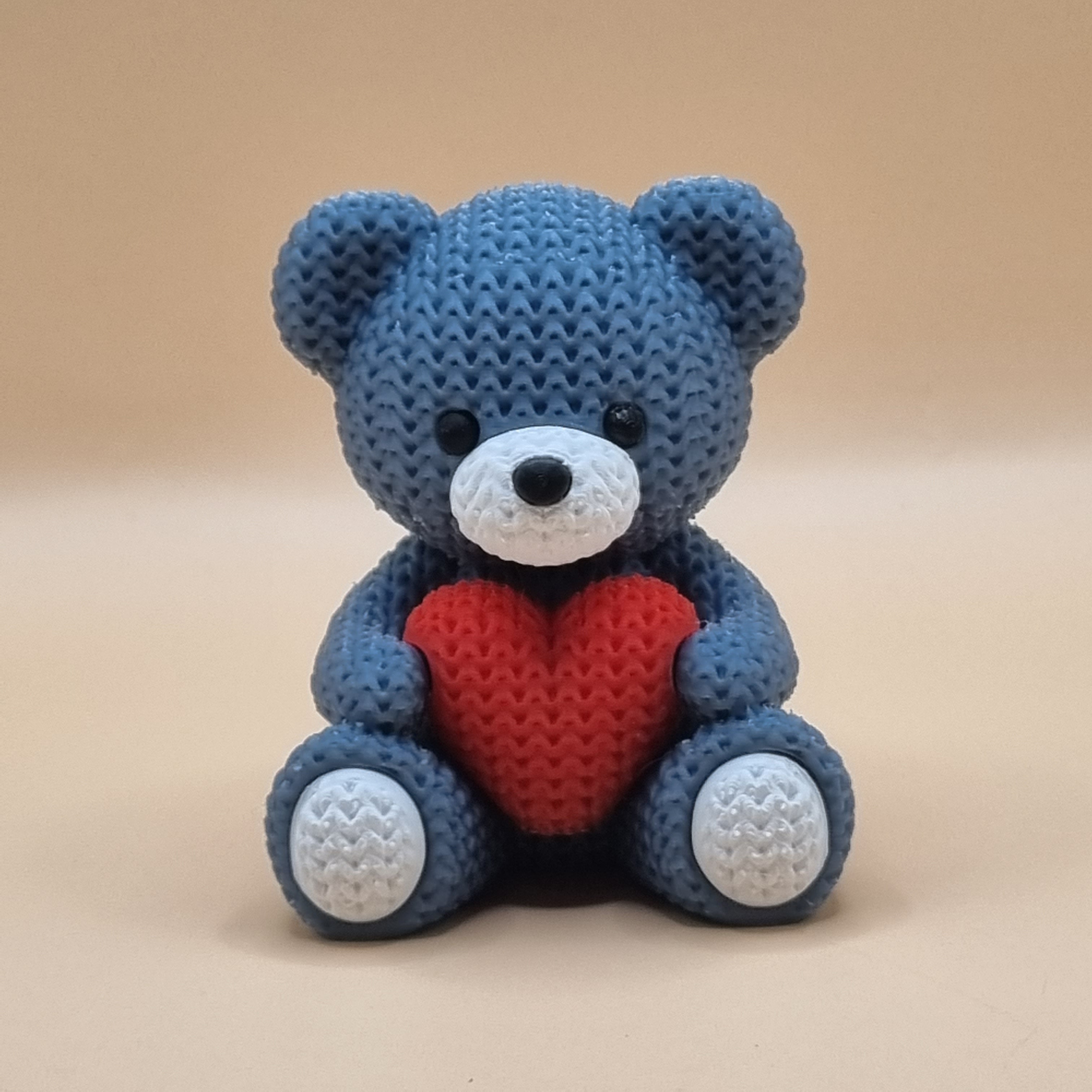 Knitted style grey teddy with heart