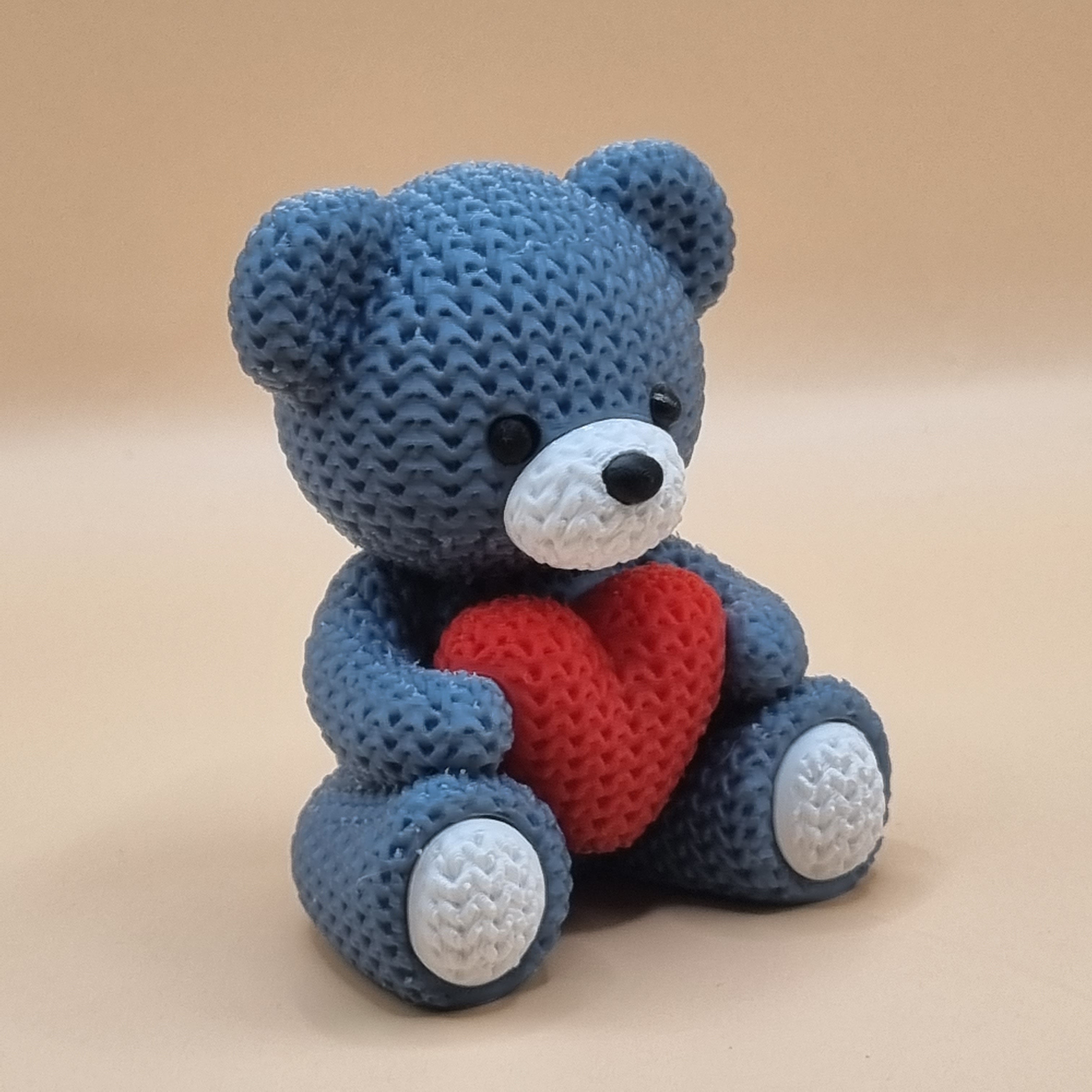 Knitted style grey teddy with heart