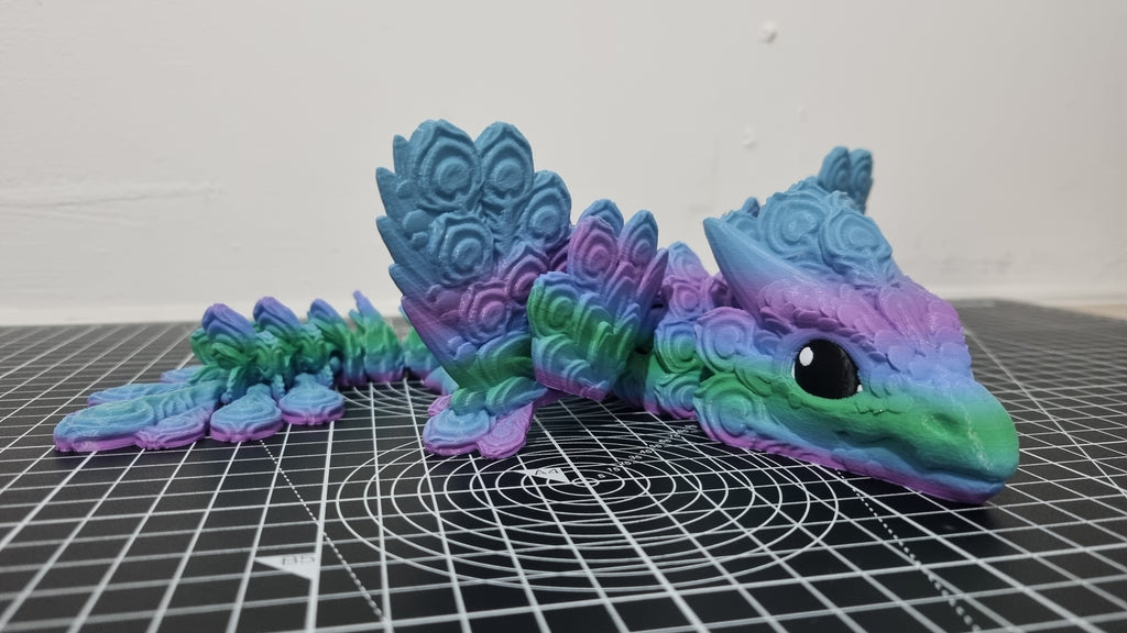 Baby peacock dragon