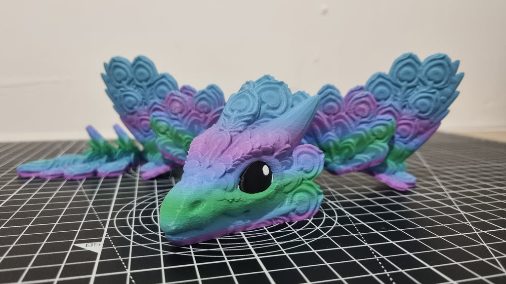 Baby peacock dragon
